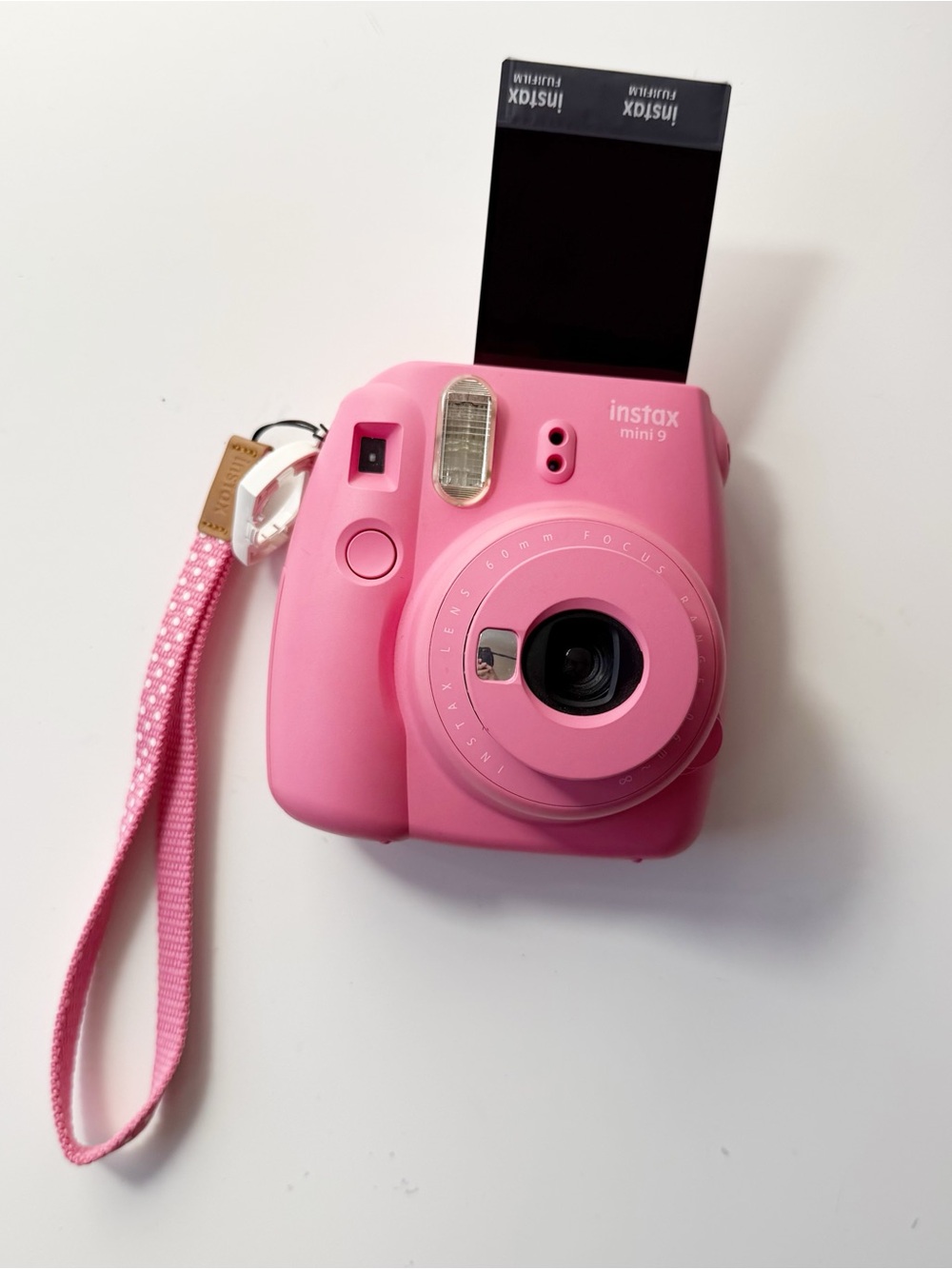 Fujifilm Instax Mini 9 instant film camera in Flamingo Pink